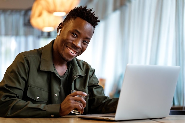 African american man using computer