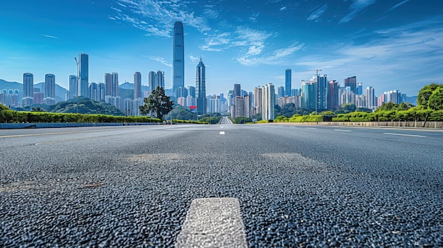 Photo asphalt road leading to a cityscape