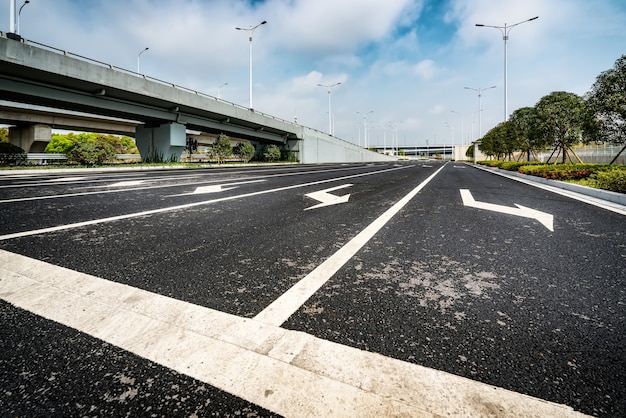 Asphalt road and urban viaduct