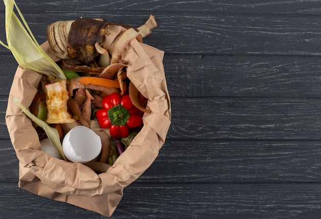 Assortment of compost made of rotten food with copy space