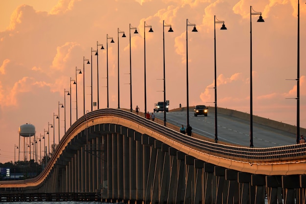 Barron Collier Bridge and Gilchrist Bridge in Florida with moving traffic Transportation infrastructure in Charlotte County connecting Punta Gorda and Port Charlotte over Peace River