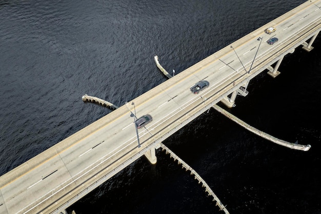 Barron Collier Bridge and Gilchrist Bridge in Florida with moving traffic Transportation infrastructure in Charlotte County connecting Punta Gorda and Port Charlotte over Peace River