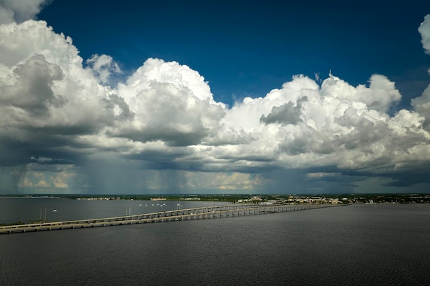 Barron Collier Bridge and Gilchrist Bridge in Florida with moving traffic Transportation infrastructure in Charlotte County connecting Punta Gorda and Port Charlotte over Peace River