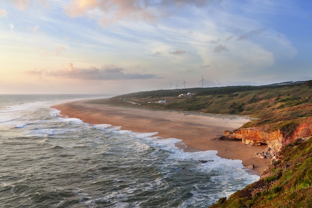 The beach north of Nazare in Portugal. Sunset time