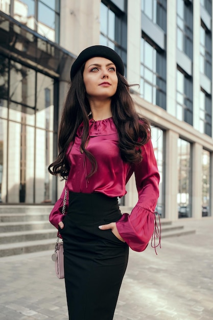 Beautiful brunette woman dressed in retro style