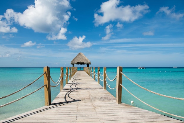 Beautiful gazebo in Caribbean sea with tuquoise water and blue sky