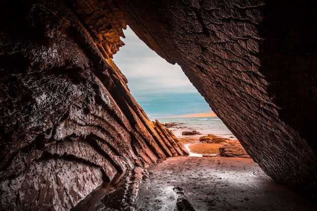 Beautiful natural cave used in the filming of game of thrones in the flysch of the Itzurun beach in Zumaia. Basque Country