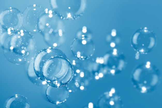 Photo beautiful transparent blue soap bubbles background.
