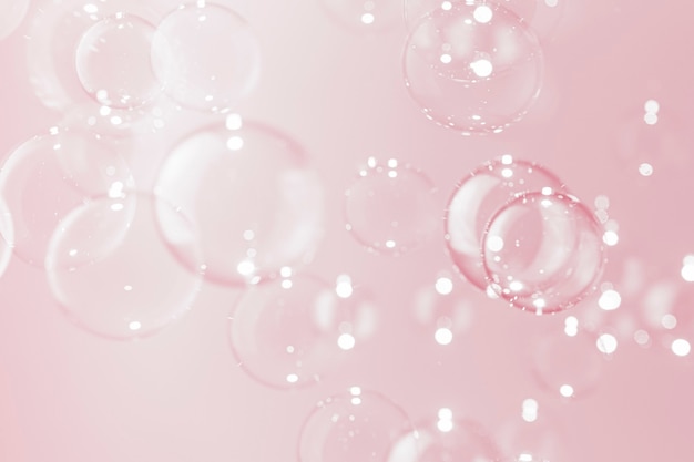 Photo beautiful transparent pink soap bubbles background.