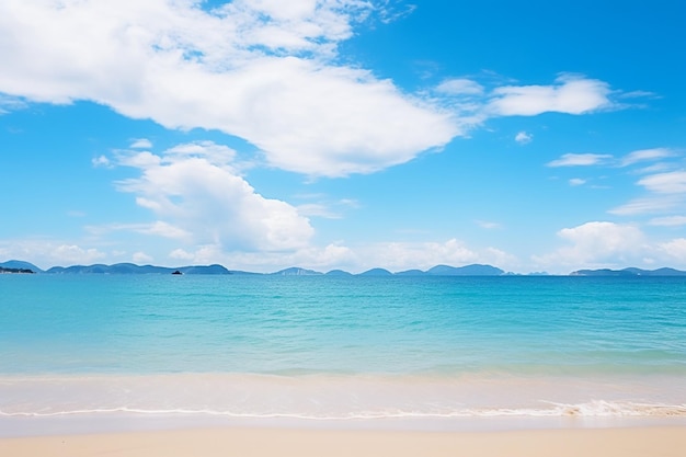 Photo beautiful tropical beach sea ocean with white cloud and blue sky background for travel vacation trip