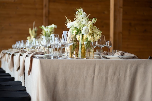 beautiful wedding table setting with candles and flowers