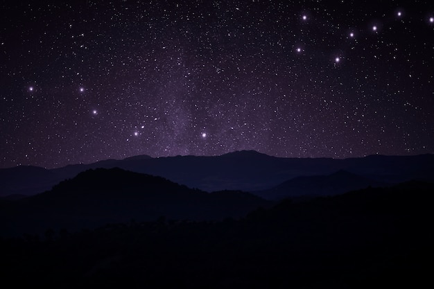 Beeautiful landscape with mountain and starry sky