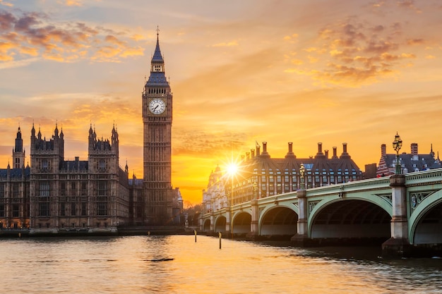 Photo big ben and westminster bridge at sunset