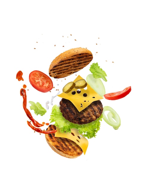 Big tasty hamburger with flying elements isolated on white background Flying burger Green background Double cheeseburger