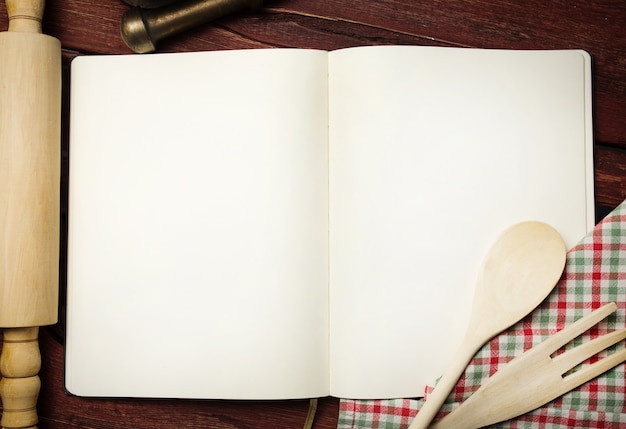 Photo blank recipe book on wooden table