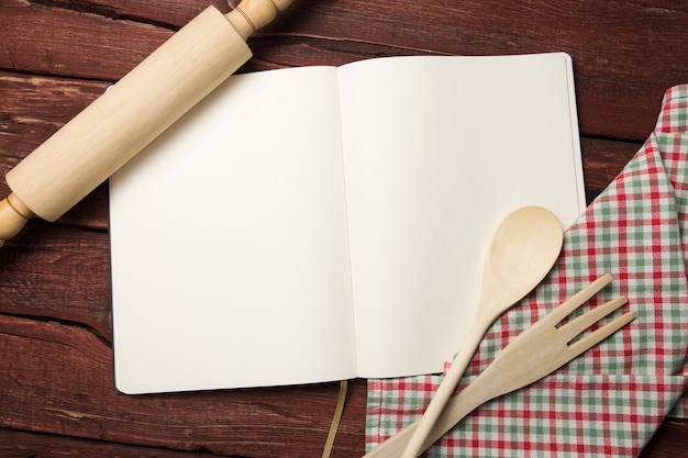 Photo blank recipe book on wooden table