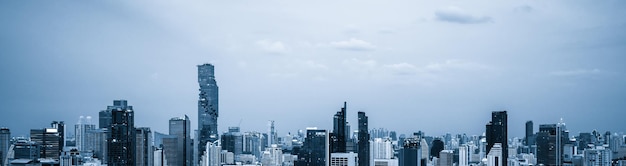 Bluefiltered cityscape and highrise buildings in metropolis city center