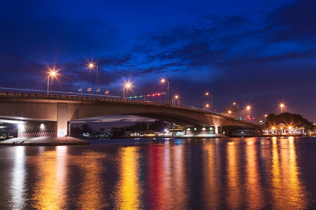 bridge over river in the evening.