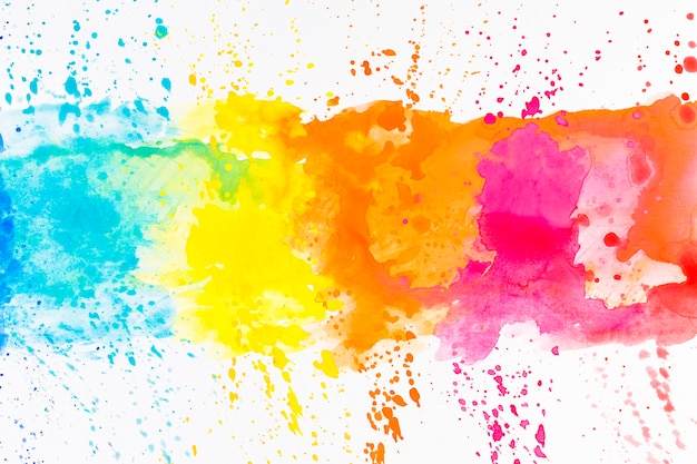 Bright splashes of dye on white