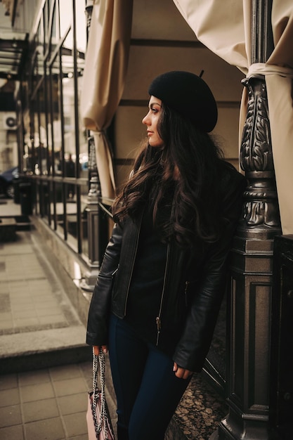 Brunette woman walking around the city