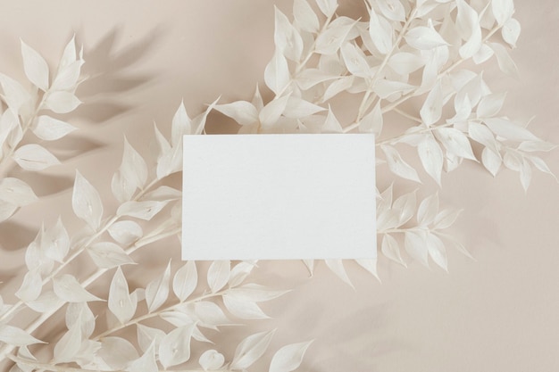 Business card on ornamental branches mockup