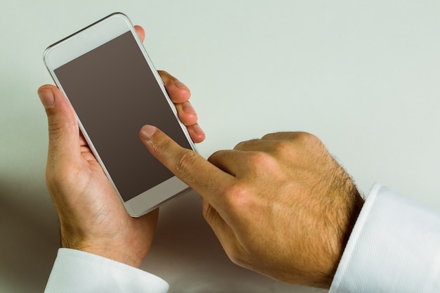 Businessman using his smart phone