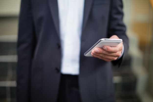 Businessman using mobile phone