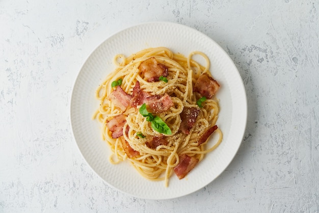 Carbonara pasta. Spaghetti with pancetta, egg, parmesan cheese and cream sauce