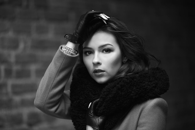 Charming fashion female modell in a coat