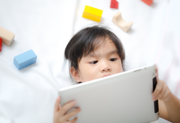 Children play Tablet on white background