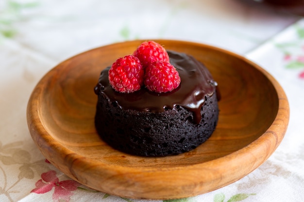 chocolate muffins with icinghomemade chocolate lava cakefondant lava cupcakecupcake with berries