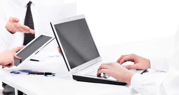 Close up of group of business people working in the office