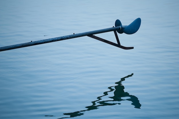 Close up of a motorboat outboard engine propeller