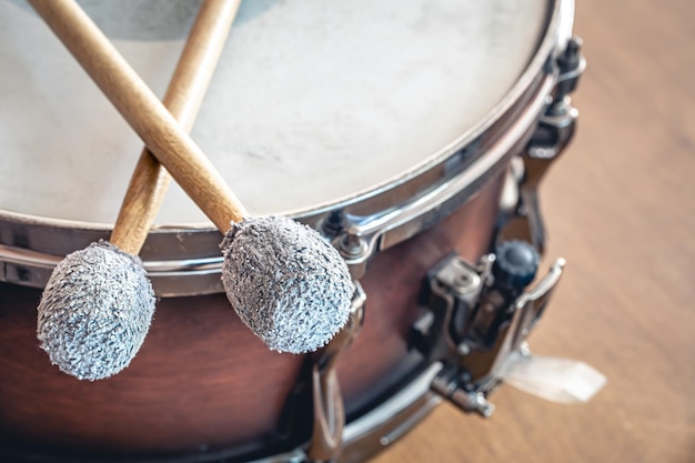 Closeup drumsticks on a blurred background