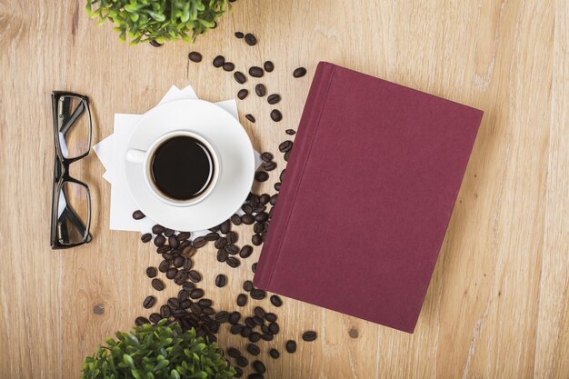 Coffee glasses and book