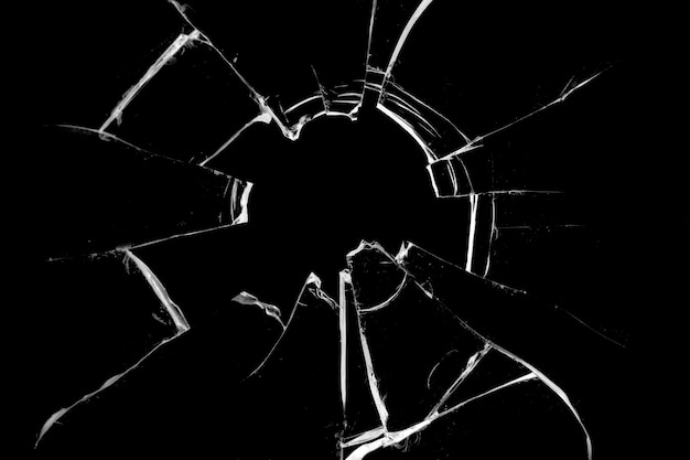 Concept of broken glass with hole for design on black background