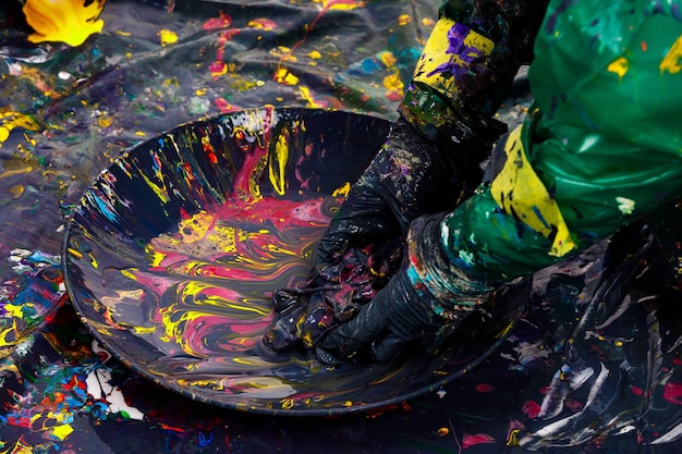 Container with multicolored paints