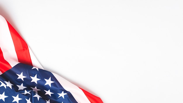 Crumpled United States flag on white background 