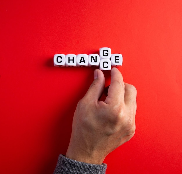 Photo cube with word change to chance personal development and career growth or change yourself concept