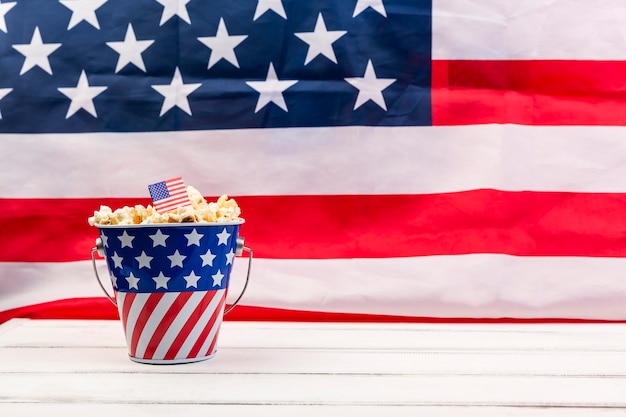 Cup with American flag and crunchy popcorn 