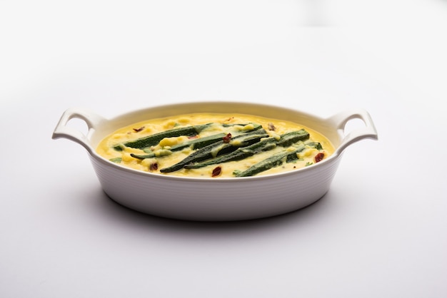 Dahi Bhindi or Okra in Yogurt Gravy, served in a bowl or karahi, selective focus