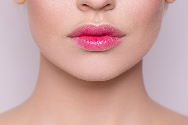 Delicate pink lips closeup Natural nude lips closeup Botex Beautiful natural lips