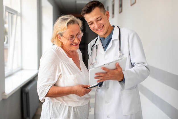 Doctor talking with senior woman