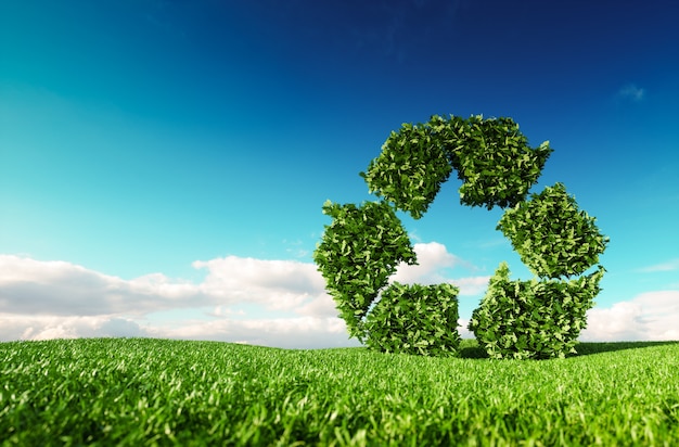 Photo eco friendly recyclation concept. 3d rendering of green recycle icon on fresh spring meadow with blue sky in background.