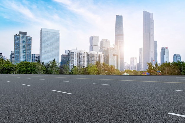 Photo the empty asphalt road is built along modern commercial buildings in china's cities