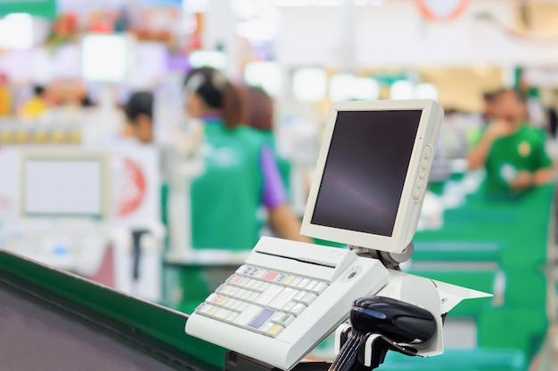 Photo empty cashier checkout desk with terminal in supermarket