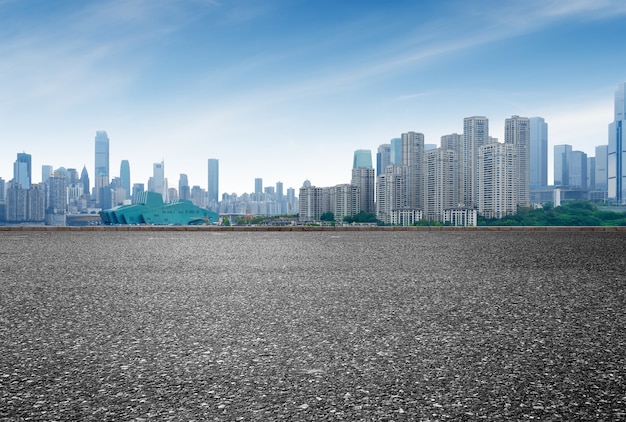 Expressway in front of the city skyline, Chongqing, China.