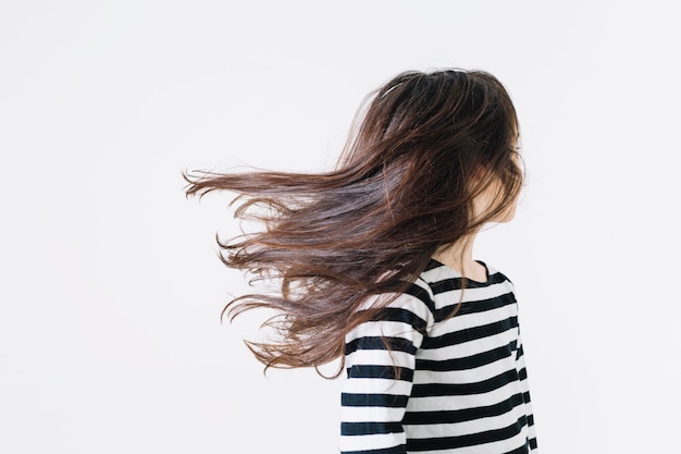 Photo faceless girl shaking hair