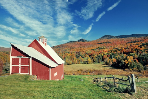 A farm house and Autumn foliage in New England