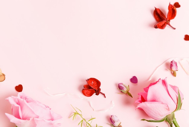 Festive flower composition on the white wooden background Overhead view